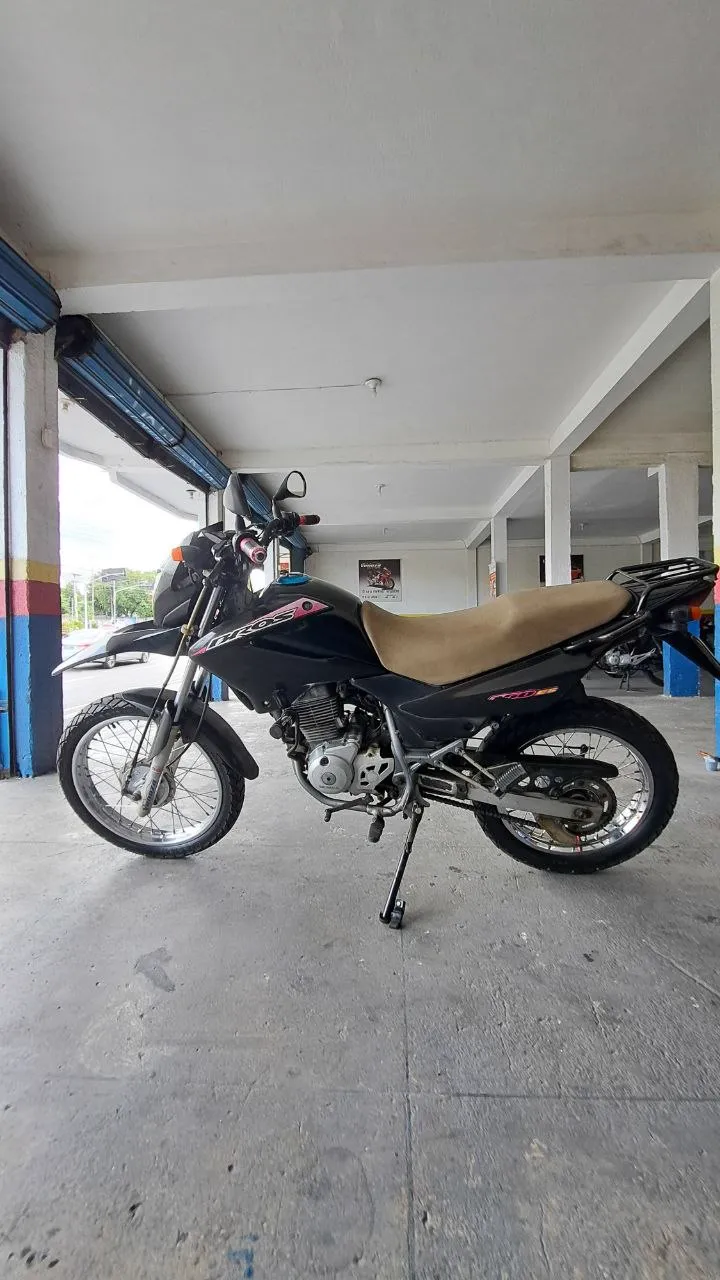 HONDA BROS 150 ES LATERAL ESQUERDA